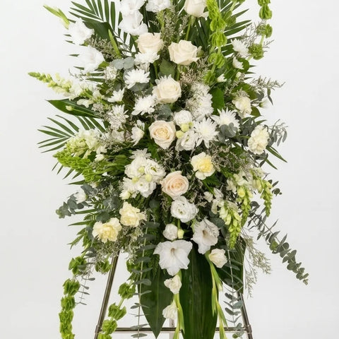 White Standing Spray, hand-arranged by Florent Floral for same-day sympathy flower delivery in Newmarket Ontario