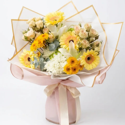 Yellow gerbera wrapped bouquet for birthday flower delivery in Newmarket Ontario