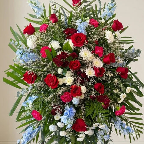 Blue & Red Standing Spray viewed from another angle, sympathy delivery Newmarket Ontario