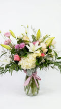 Lily Sympathy Arrangement, hand-arranged by Florent Floral for same-day sympathy flower delivery in Newmarket Ontario