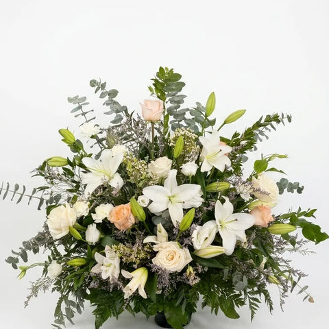 Mixed Pastel Tribute Arrangement, hand-arranged by Florent Floral for same-day sympathy flower delivery in Newmarket Ontario