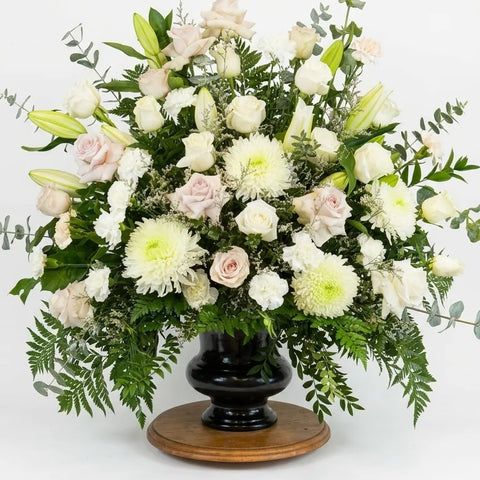 White & Pale Pink Sympathy Arrangement, hand-arranged by Florent Floral for same-day sympathy flower delivery in Newmarket Ontario